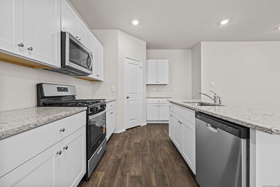 Furnished interior view inside a new home in Riverstone at Westpointe, San Antonio (Image 7).