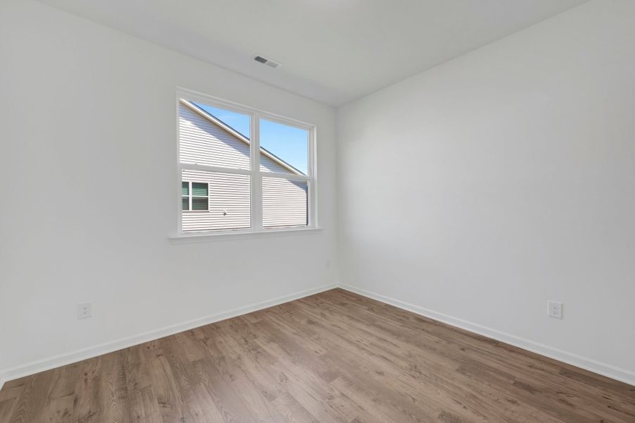 Spacious, unfurnished interior of a new home in Providence Creek, Fuquay Varina (Image 11).