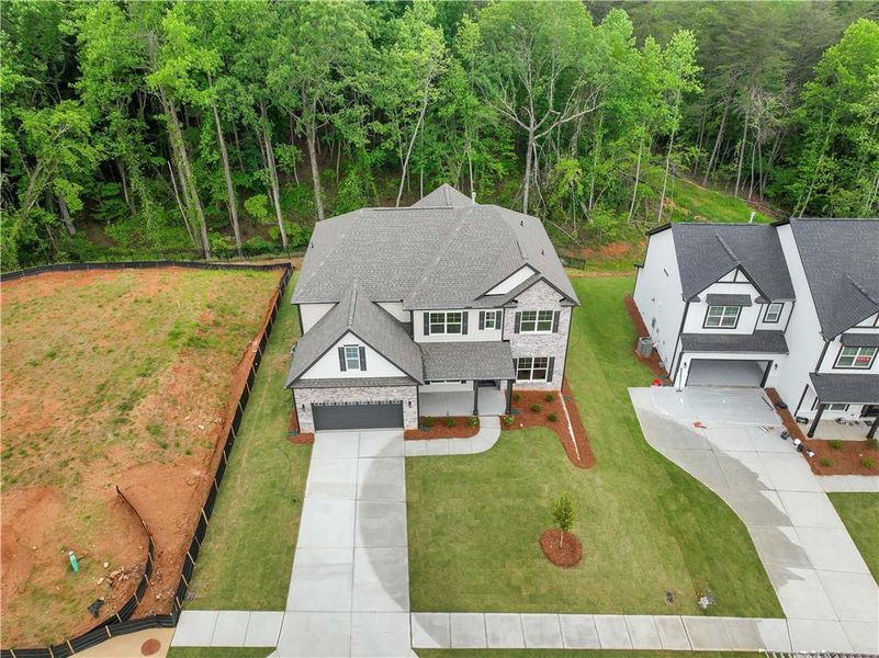Front exterior of a new home in Arbor West, Dawsonville, GA, highlighting curb appeal (Image 2).
