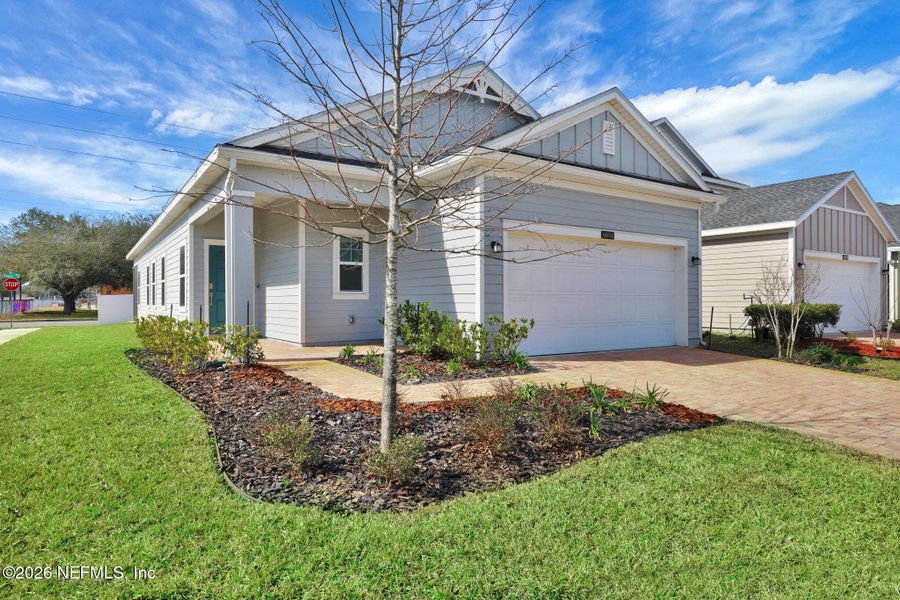 Front exterior of a new home in , Jacksonville, FL, highlighting curb appeal (Image 21).