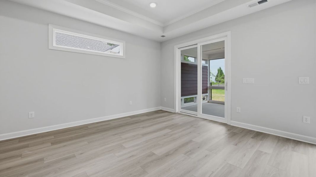 Spacious, unfurnished interior of a new home in The Courtyards at Oak Grove, Durham (Image 21).