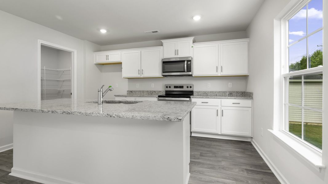 Furnished interior view inside a new home in Greystone North, Stoneville (Image 5).