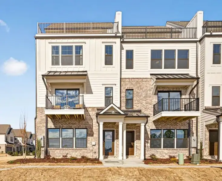 Representative exterior details of a home built from the Hollis TH by True Homes in North District at Flowers Plantation Townhomes, Clayton (Image 2).