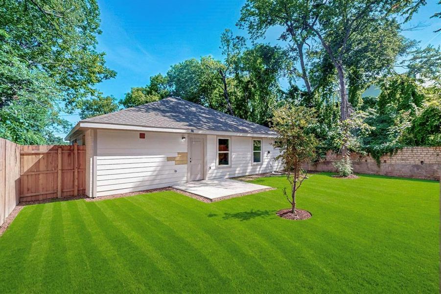 Front exterior of a new home in , Dallas, TX, highlighting curb appeal (Image 2).
