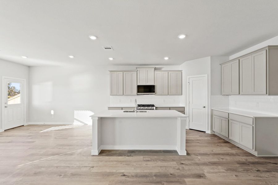 Furnished interior view inside a new home in Woodshore, Clute (Image 12).