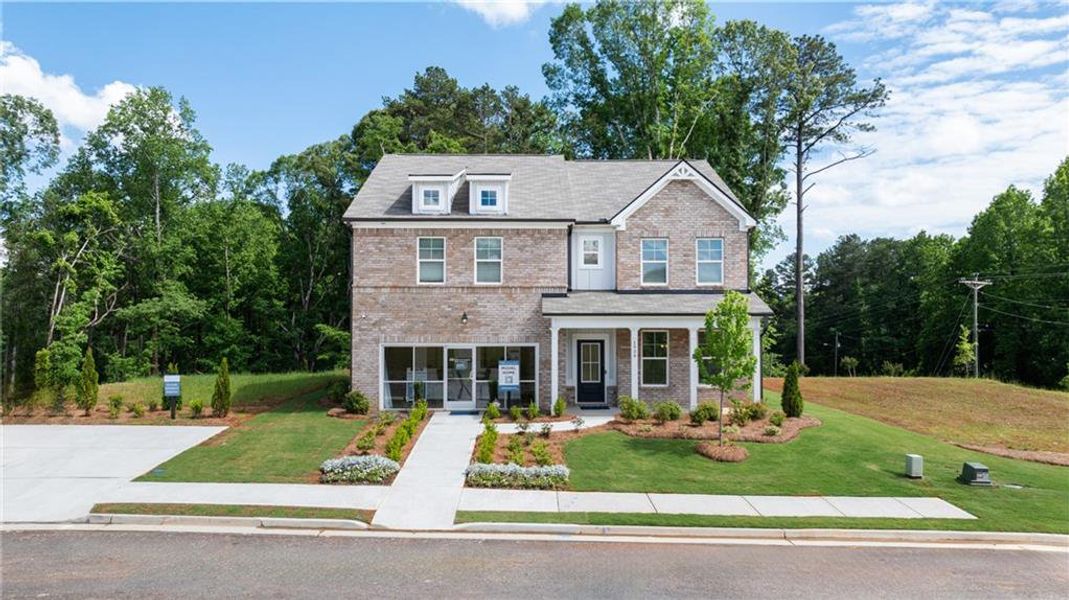 Front exterior of a new home in Alcovy Village, Lawrenceville, GA, highlighting curb appeal (Image 30).