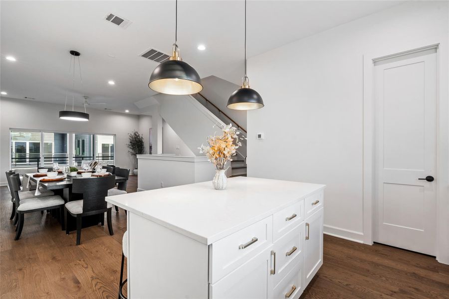 The layout creates an easy flow, so you can be in the kitchen and still enjoy time with family in the dining or living areas.