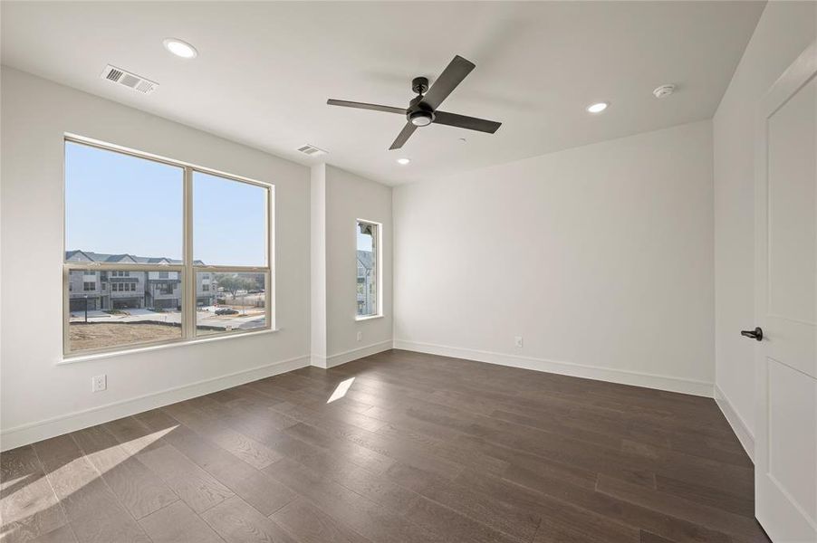 The dreamy owner's suite in our Palmer floor plan offers plenty of space to rest and relax.