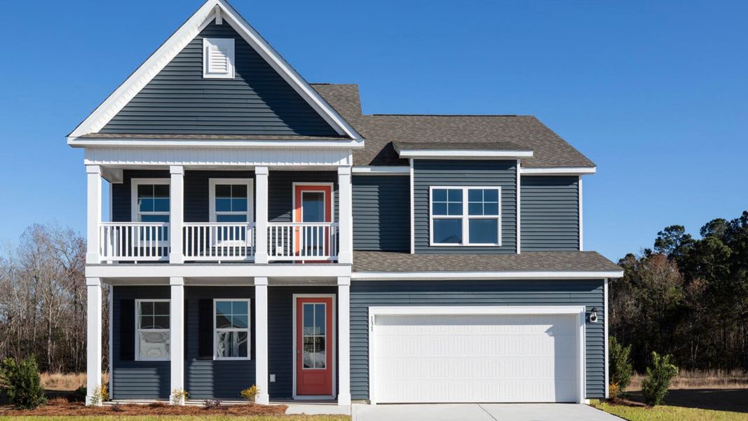 Representative exterior photo of a completed home built from the HARBOR OAK by D.R. Horton in The Grove at Blake Farm, Wilmington, NC (Image 1). Representative exterior photo of a completed home built from the HARBOR OAK by D.R. Horton in The Grove at Blake Farm, Wilmington, NC (Image 1).