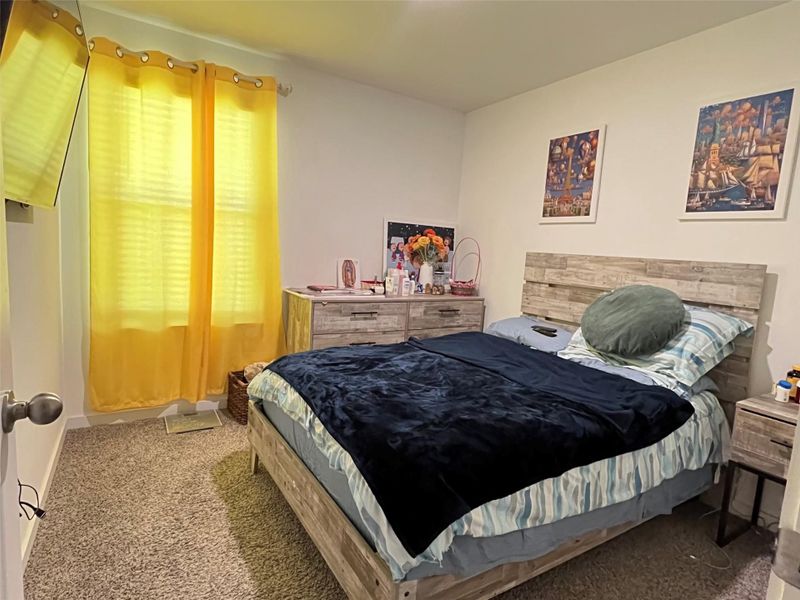 Cozy bedroom with soft carpeting