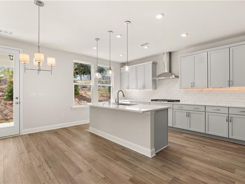 Furnished interior view inside a new home in Melody Lakeside Estates, Buford (Image 4).
