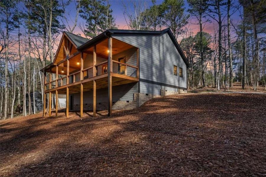 Exterior details and patio area of a home in , Ellijay (Image 23).