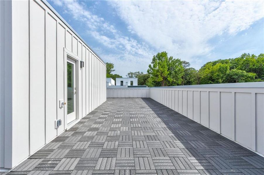 Exterior details and patio area of a home in The Moderns at Sugar Creek Phase III, Atlanta (Image 3).