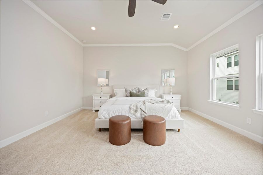 Ample space accommodates a king-size bed effortlessly, affirming the primary bedroom as a suite of grand proportions.