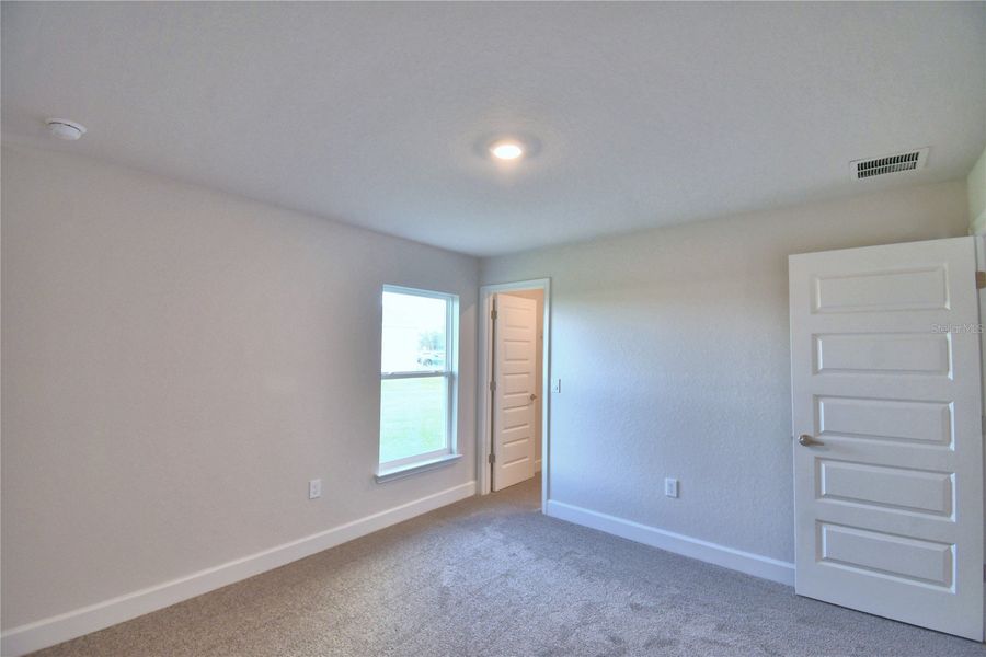 Spacious, unfurnished interior of a new home in Cadence Crossing, Auburndale (Image 33).
