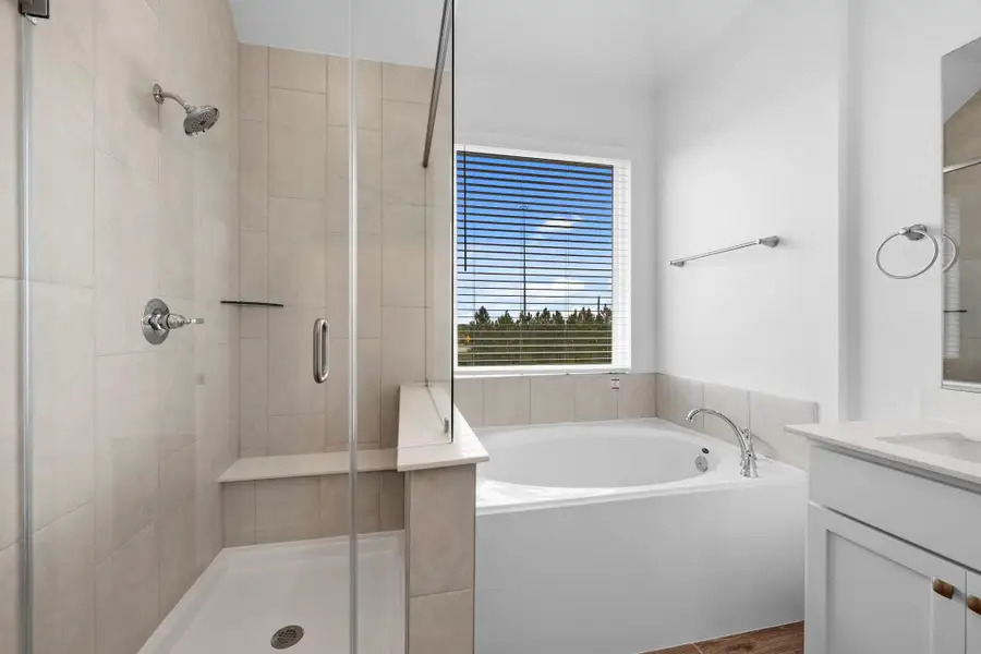 Furnished interior view inside a new home in Bridgeland, Cypress (Image 8).