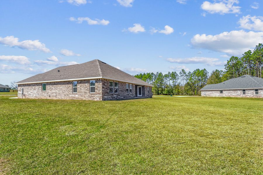 Representative exterior photo of a completed home built from the The Turquoise by Herbst Homes in Clear Water Landing, Milton, FL (Image 47).