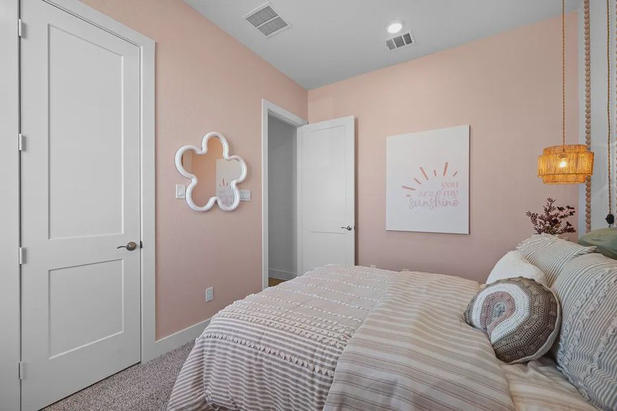 Representative furnished interior of a home built from the Bonneville by Chesmar Homes in Grange, Katy (Image 28).