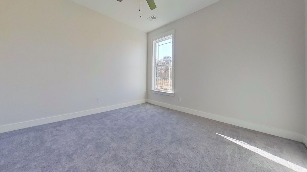 Representative unfurnished interior of a home built from the Addington by Enchanted Homes in Davis Heights, Inman (Image 25).