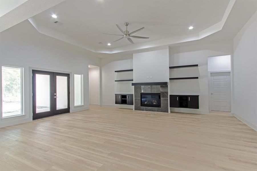 Expansive living area featuring ample shelving for stylish decor.