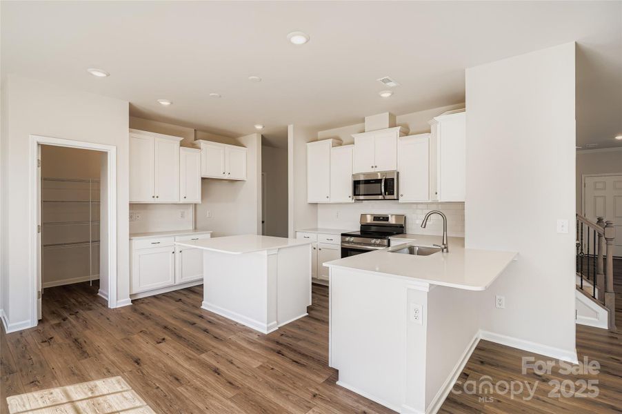 Furnished interior view inside a new home in Shannon Woods: Walk & Enclave, Maiden (Image 7).
