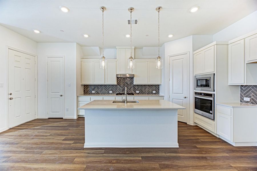 Brown Townhome Kitchen by Ashton Woods