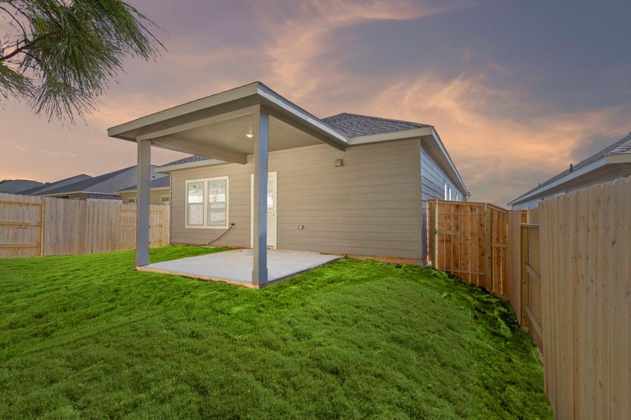Exterior details and patio area of a home in Westridge Cove, Conroe (Image 3).