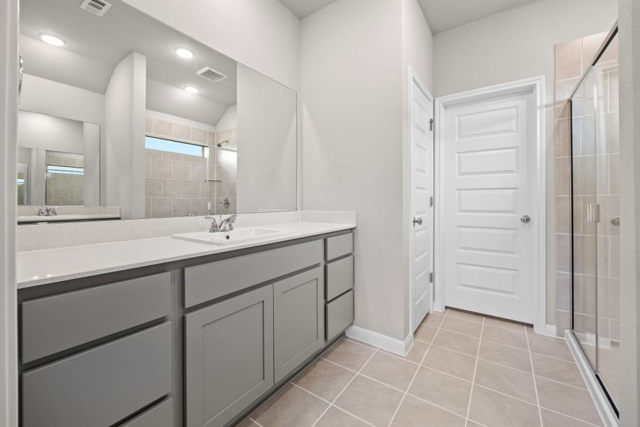 Primary Bathroom in the Spruce home plan by Trophy Signature Homes - REPRESENTATIVE PHOTO Primary Bathroom in the Spruce home plan by Trophy Signature Homes - REPRESENTATIVE PHOTO
