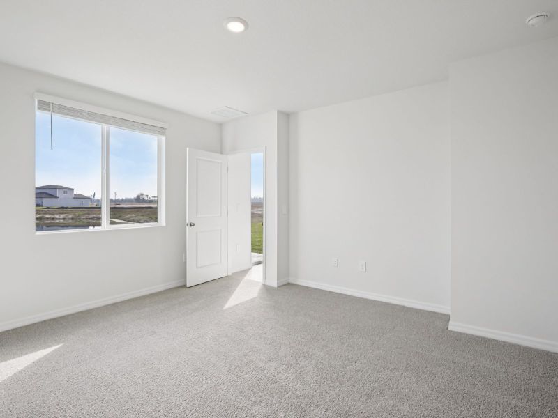 Spacious, unfurnished interior of a new home in Oakfield Trails - Premier Series, Parrish (Image 14).