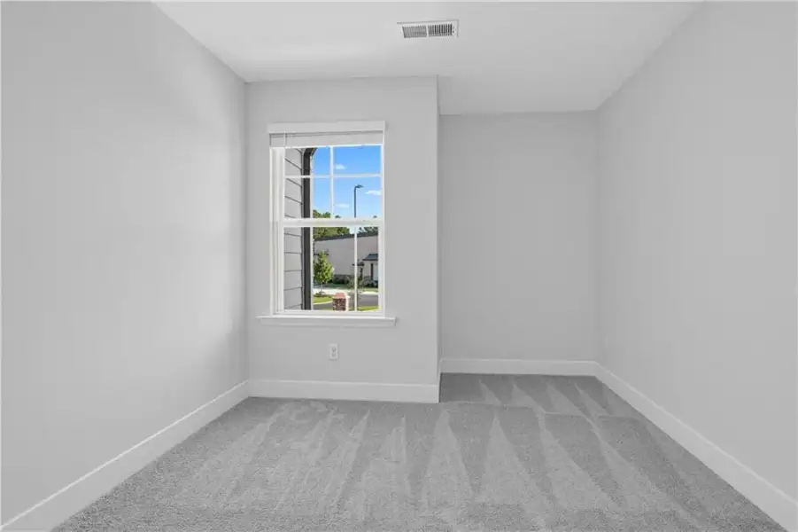 Spacious, unfurnished interior of a new home in Towns at Holly Springs, Holly Springs (Image 24). Spacious, unfurnished interior of a new home in Towns at Holly Springs, Holly Springs (Image 24).