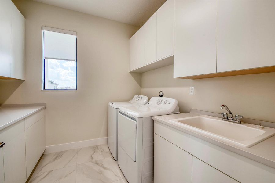 Furnished interior view inside a new home in Apex at Avenir, Palm Beach Gardens (Image 38).