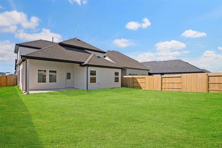 Covered patio provides shade and comfort for weekend get-togethers.