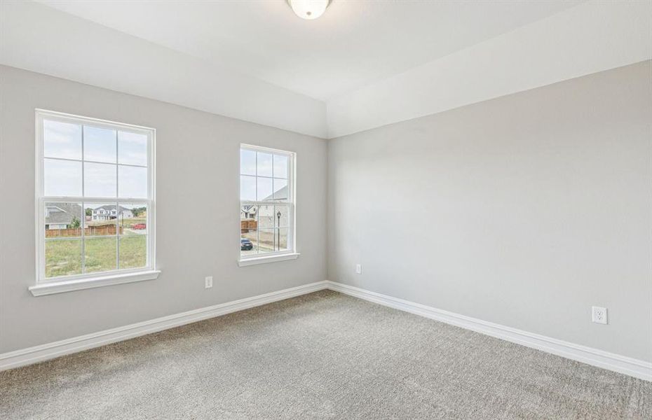 Secondary bedroom with large windows