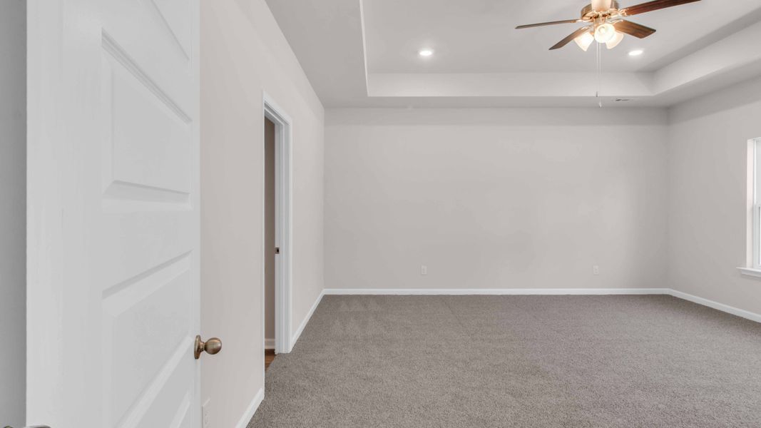 Representative unfurnished interior of a home built from the Fraser by D.R. Horton in Riverwood Gardens, Oakland (Image 18).