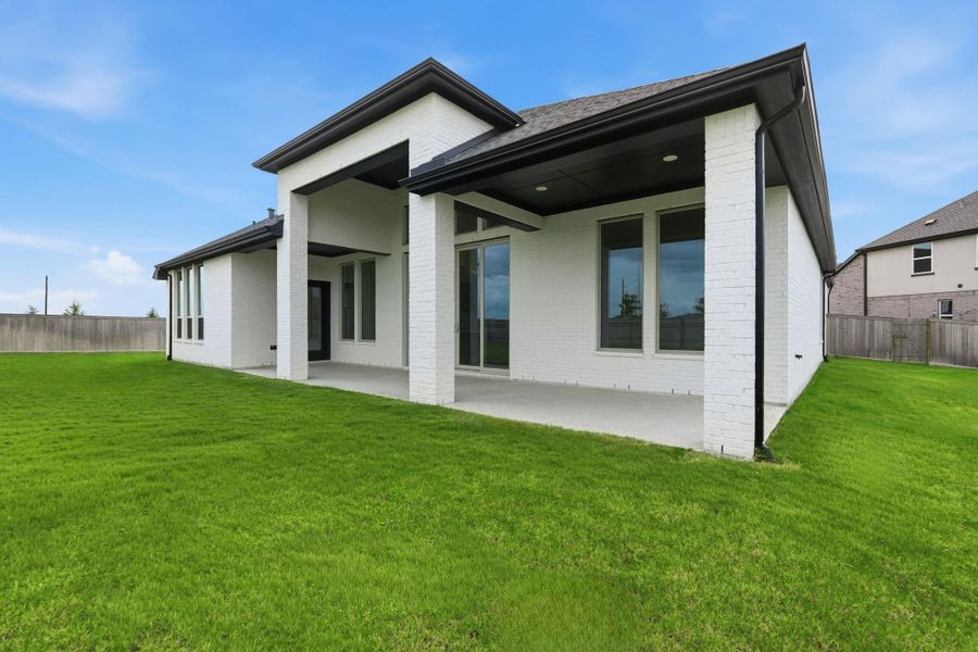 Covered porch and large backyard