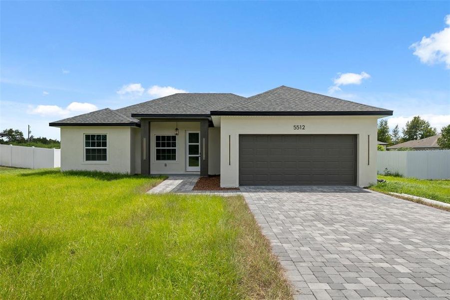 Front exterior of a new home in , Ocala, FL, highlighting curb appeal (Image 19). Front exterior of a new home in , Ocala, FL, highlighting curb appeal (Image 19).