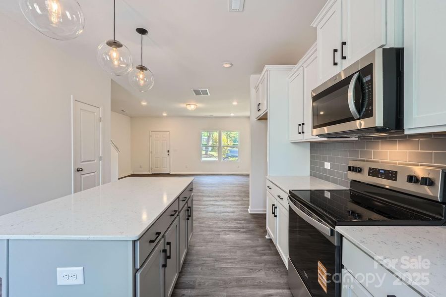 Furnished interior view inside a new home in Dukes Ridge, Charlotte (Image 14).
