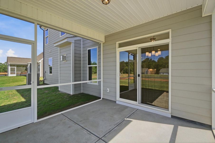 Exterior details and patio area of a home in Enclave at Riverdale, Huntersville (Image 19).