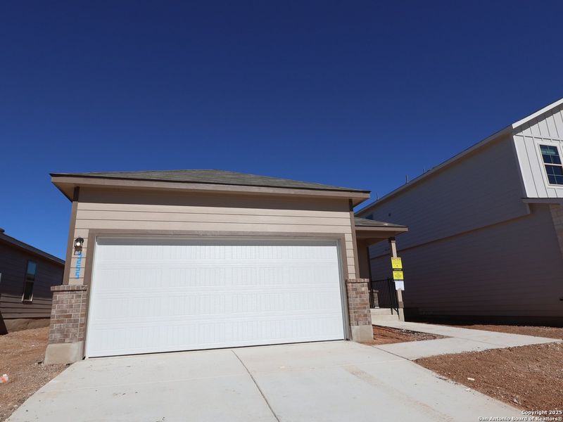 Exterior details and patio area of a home in Park Place, New Braunfels (Image 21).
