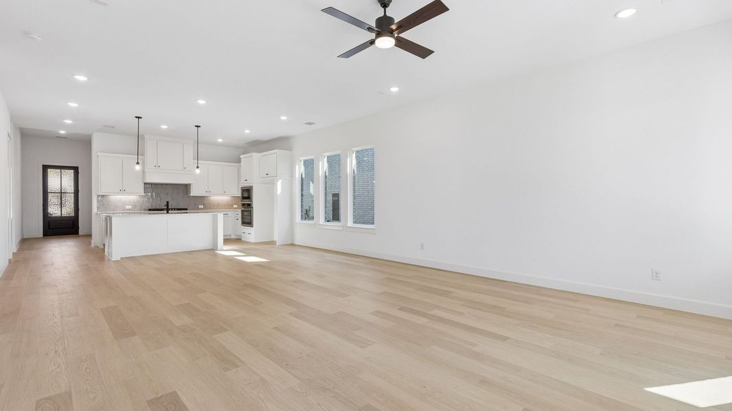 Representative unfurnished interior of a home built from the Chapelle III by Normandy Homes in Rainwater Crossing, Celina (Image 20).