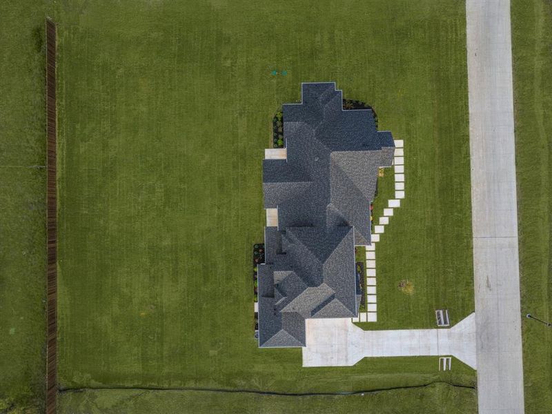 Front exterior of a new home in , Northlake, TX, highlighting curb appeal (Image 23).