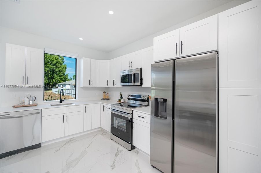 Furnished interior view inside a new home in , Florida City (Image 24).