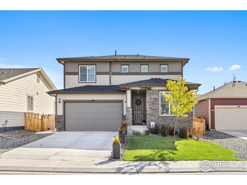 Front exterior of a new home in , Frederick, CO, highlighting curb appeal (Image 20).