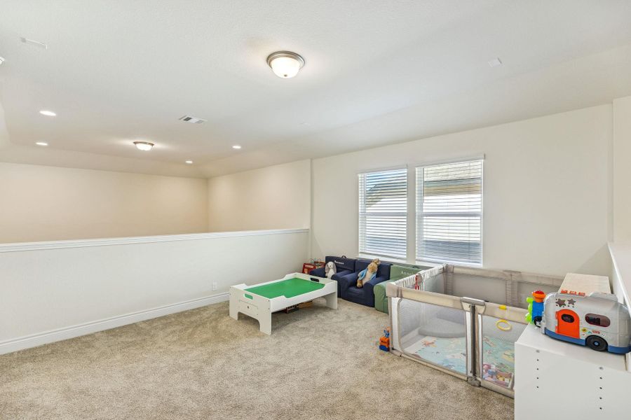 Upsairs loft area open to downstairs living room