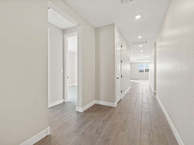 Spacious, unfurnished interior of a new home in White Tank Foothills Reserve Series, Waddell (Image 12).