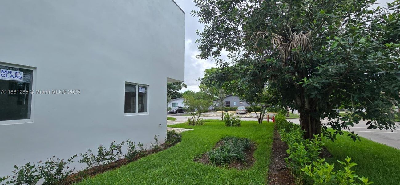 Front exterior of a new home in , Pompano Beach, FL, highlighting curb appeal (Image 14).