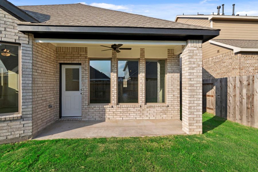 Exterior details and patio area of a home in The Trails, New Caney (Image 3).