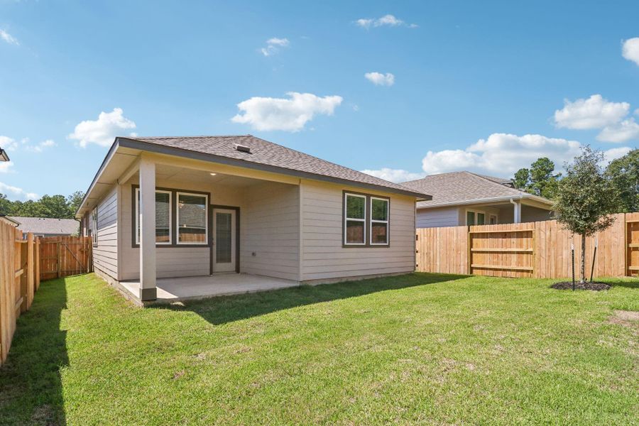 Exterior details and patio area of a home in Pine Lake Cove - Traditional Series, Montgomery (Image 18).