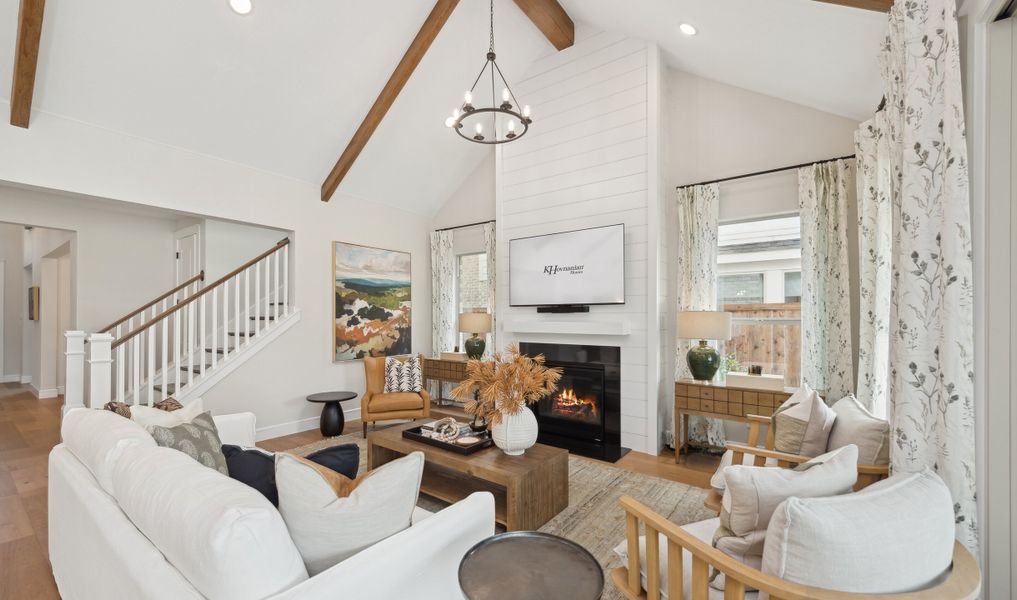 Great room with vaulted ceiling and fireplace