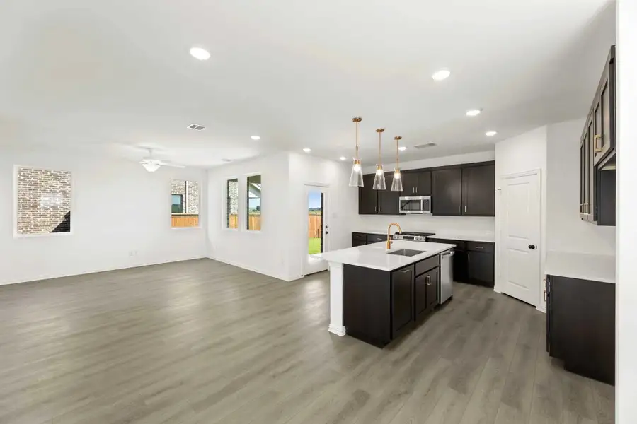 Open Kitchen-Living-Dining Room Representative Photo featuring the Oxford Collection